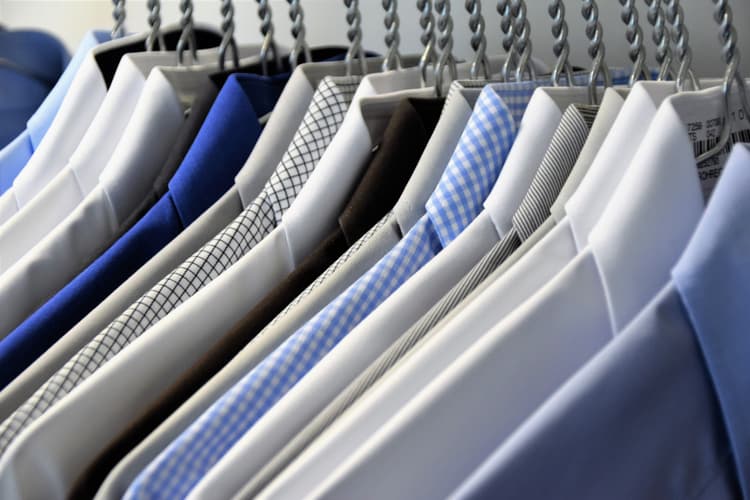 Shirts on a rack after being ironed